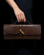 Vivienne Snake Embossed Baguette Bag