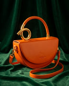 Sculptural Gold Loop Handle Crescent Crossbody Bag for Women