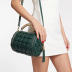Lola Textured Leather Circular Barrel Crossbody Bag