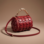 Lola Textured Leather Circular Barrel Crossbody Bag