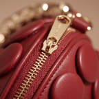 Lola Textured Leather Circular Barrel Crossbody Bag